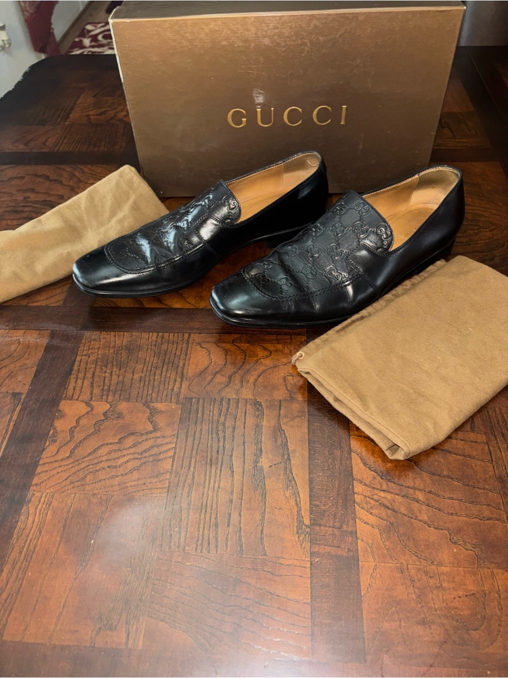 Gucci Black Embossed GG Leather Slip-Ons - Picture 13 of 13